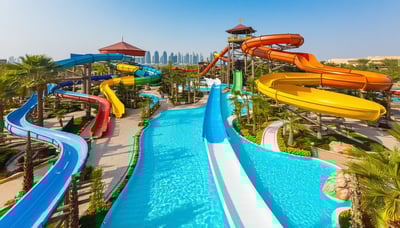 Aerial view of Aquaventure World Dubai waterpark with slides and pools Aerial view of Aquaventure World Dubai waterpark with slides and pools